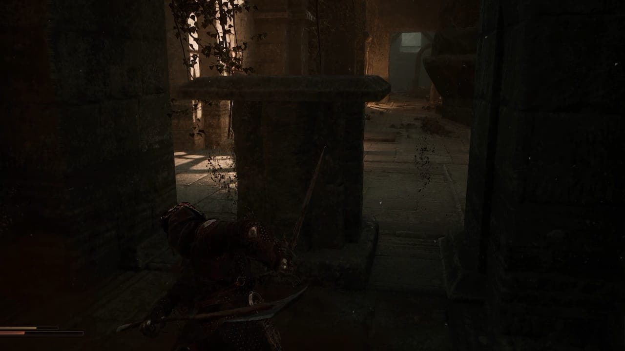 Pushing pillar in Mortal Shell 2.